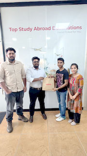 upGrad Dehradun office - student and parents with the counselling team after their study abroad session